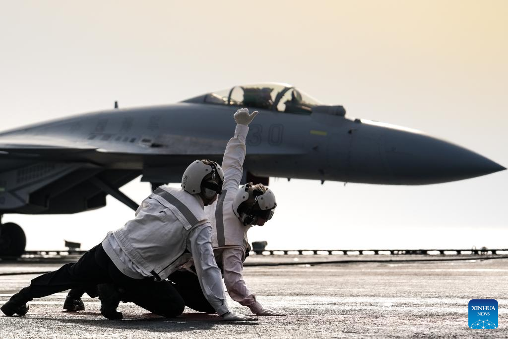 China's aircraft carrier formations return after completing far